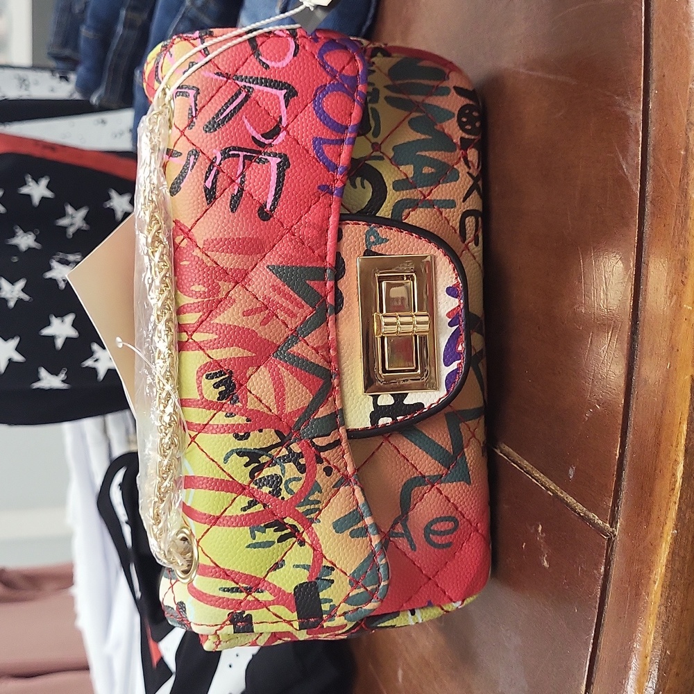 Letter print Purse w/ gold chain for Strap and pocket on back.